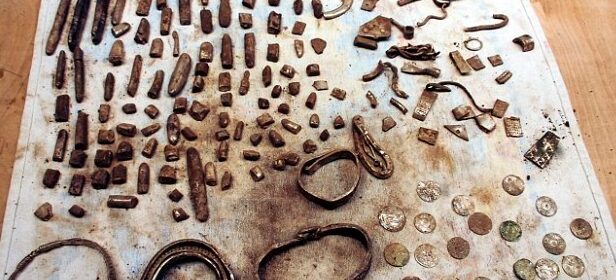 Treasure hunter digs up 200-piece haul of Viking jewellery and coins